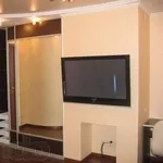 Установка навеска телевизоров на стену в Алматы