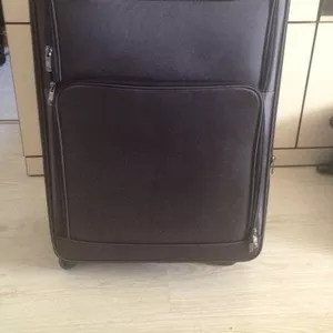 Продам новый чемодан черный текстиль