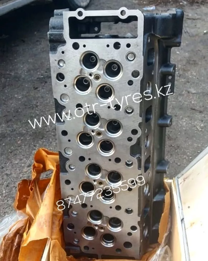 Головка на двигатель Isuzu 4hk1,  Hitachi 3