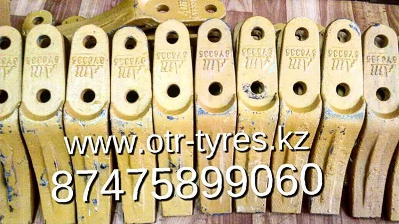 Коронки на экскаватор погрузчик Кат 428, 432, 444